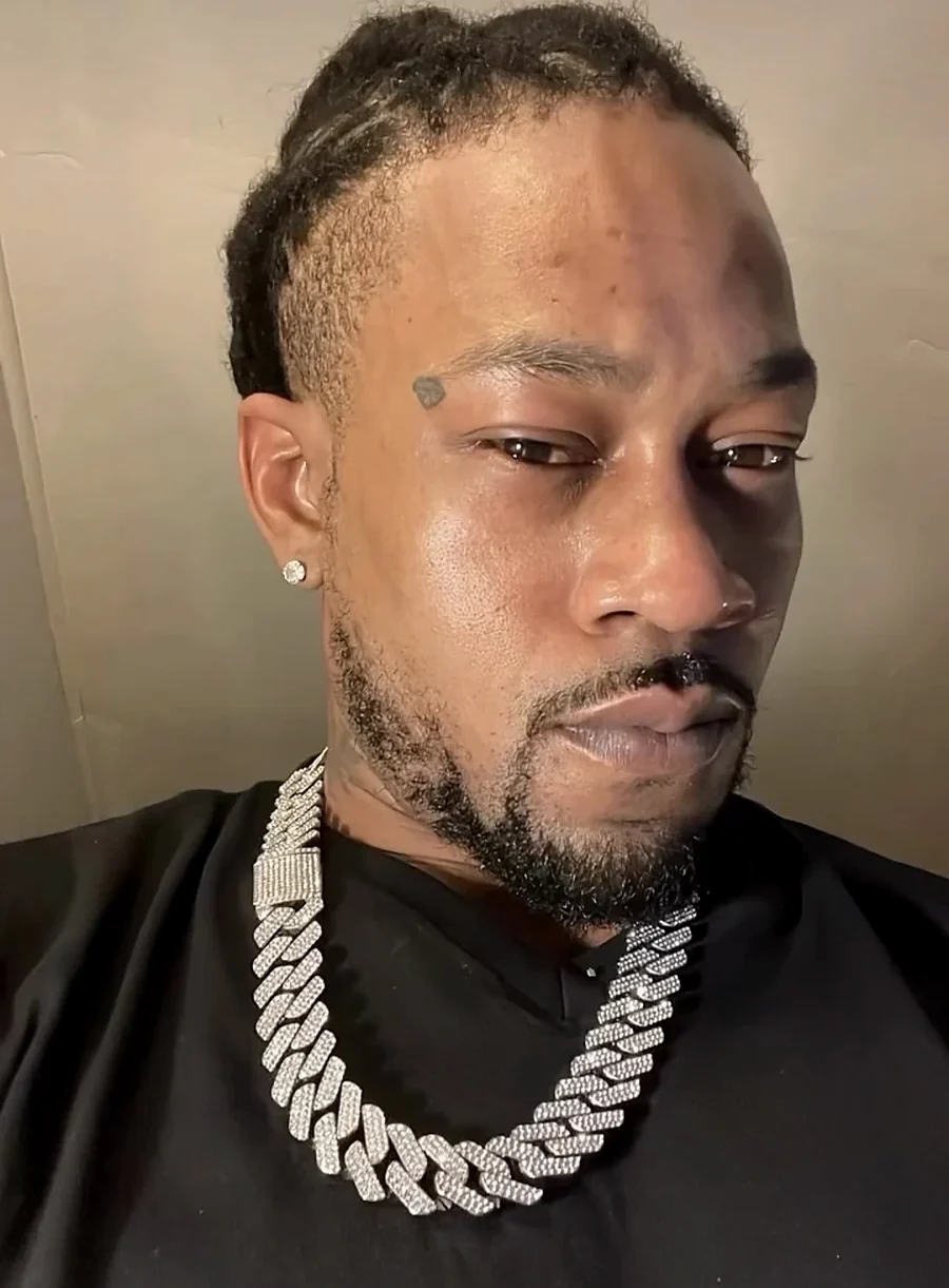 Portrait of TyRae wearing his chain